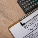A clipboard with a paper titled “REQUEST FOR QUOTATION” and a black calculator.