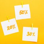 discount paper stickers on an orange background
