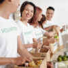 Students volunteering in branded group apparel at a charitable foundation